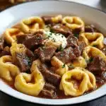Delicious Cheesesteak Tortellini served in a bowl with toppings