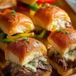 Delicious Philly cheesesteak sliders served as a festive appetizer.